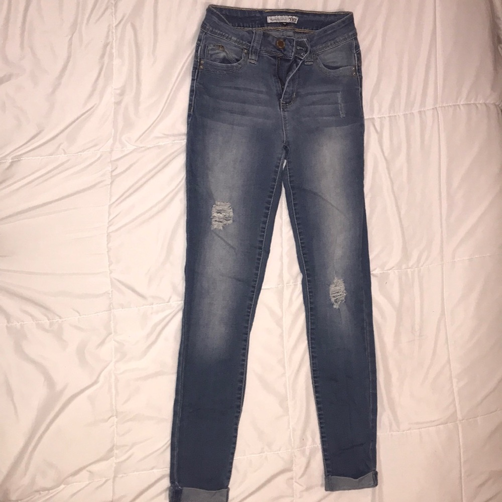 Light wash lightly distressed jeans